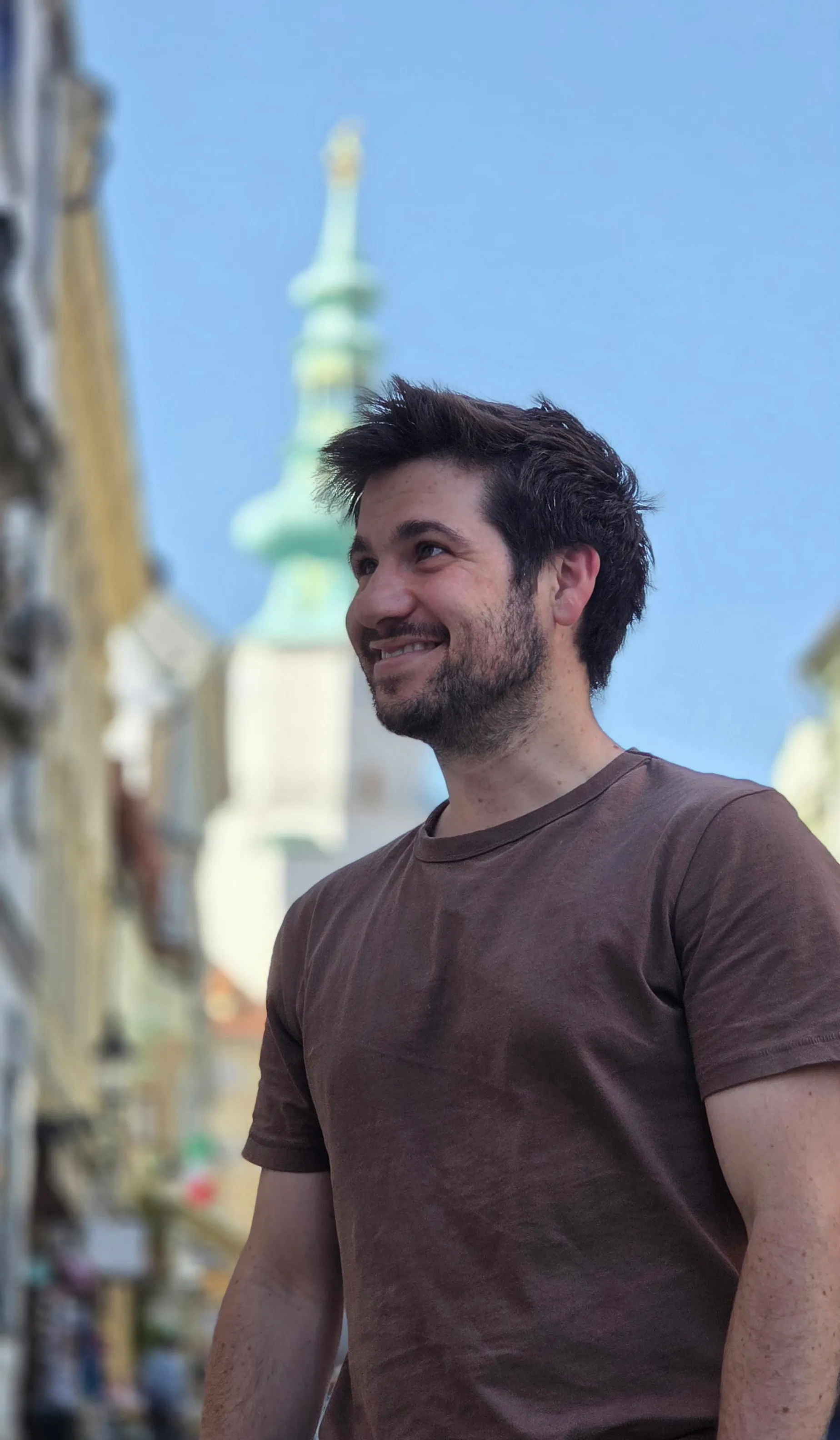 Jack Maguire smiling on a street in Bratislava, Slovakia