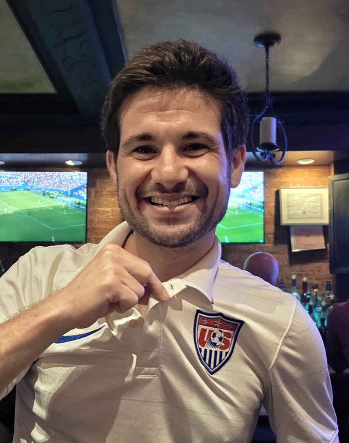 Jack Maguire at a bar wearing a US soccer jersey