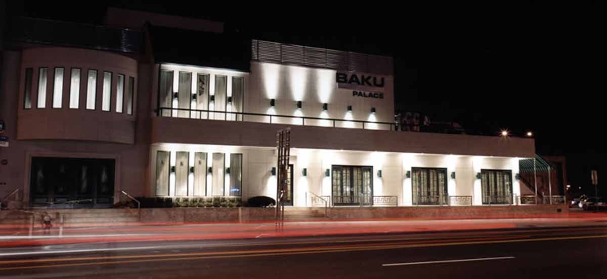 The illuminated Baku Palace exterior at night.