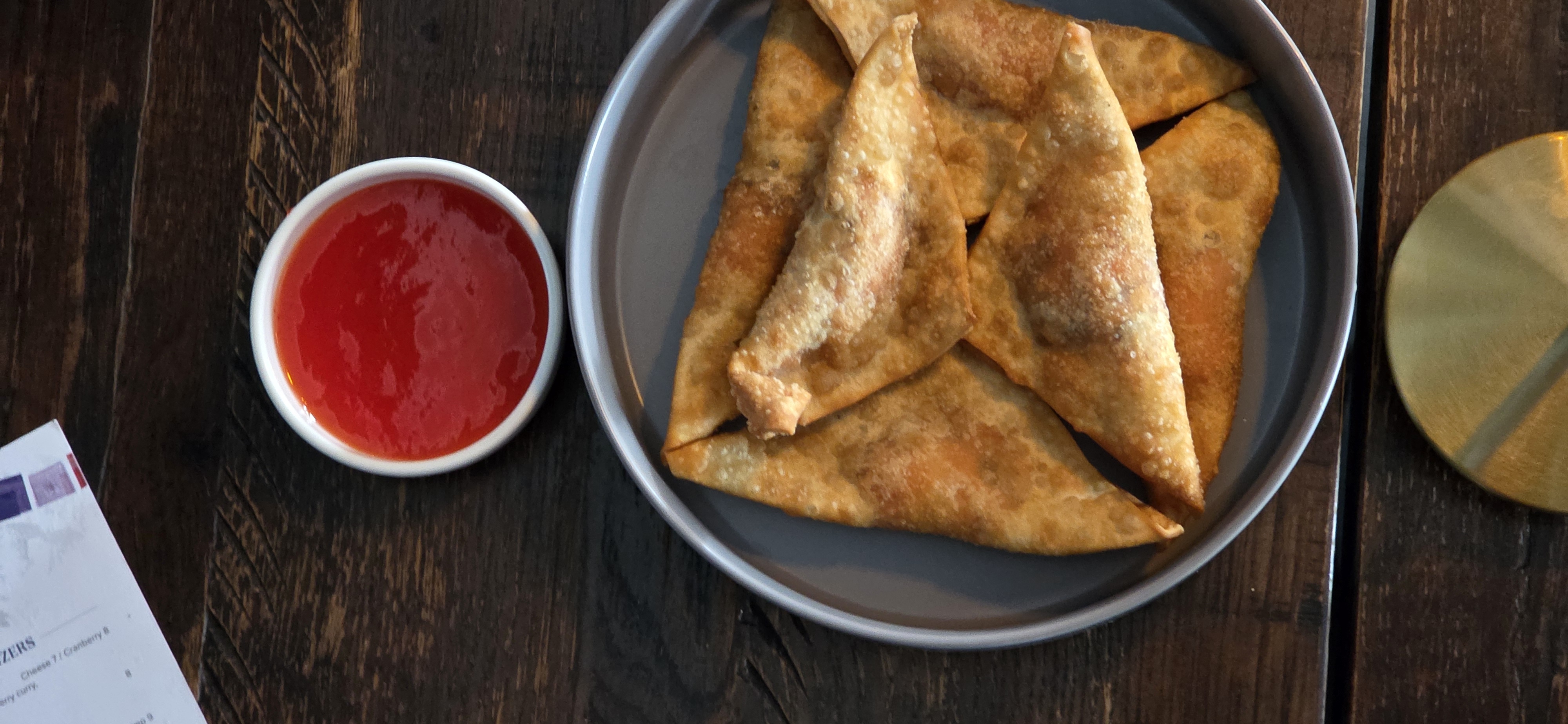 Cranberry curry puffs at INTI Kitchen & Bar